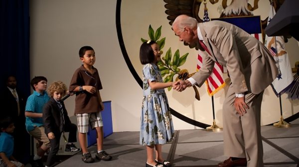 Biden greeting small children