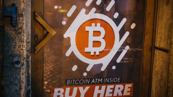 Sign advertising a Bitcoin ATM