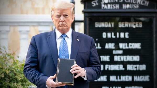 Trump holding Bible at St. John's Episcopal Church