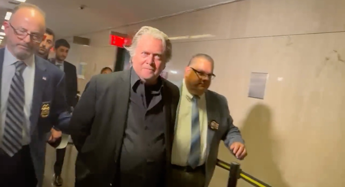 Steve Bannon in handcuffs
