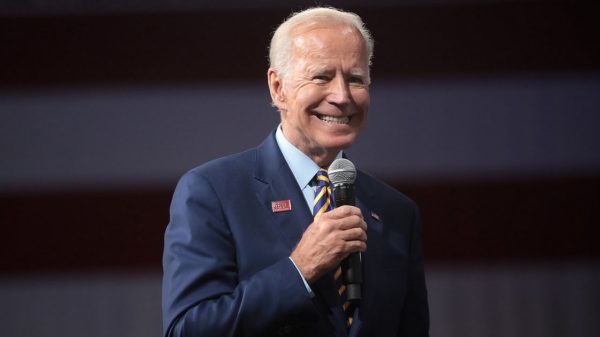 Joe Biden with a creepy smile
