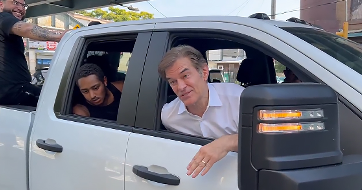 Dr. Oz in a pickup truck with addicts