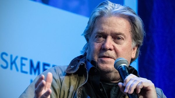 Steve Bannon speaking into a microphone
