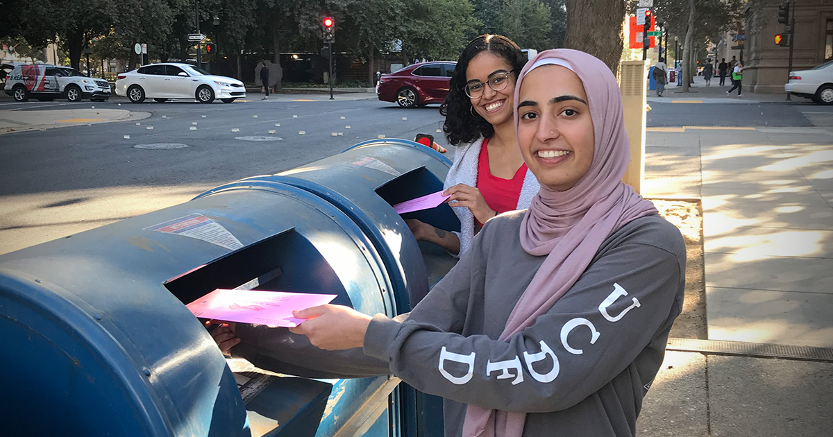Muslim women voting by mail