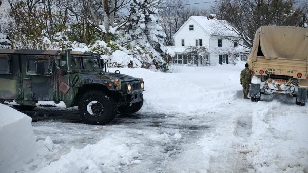 National Guard vehicles assist in snow removal in Buffalo New York