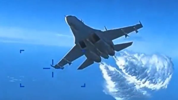 Su-27 jet pursues the Reaper