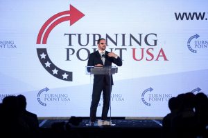 Dan Crenshaw on a TPUSA stage