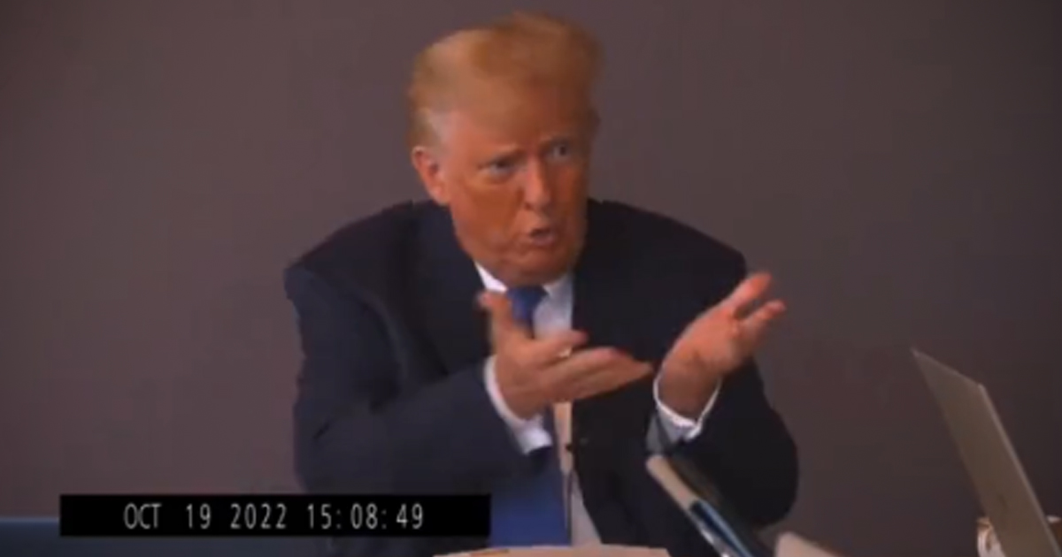 Donald Trump sitting for a deposition