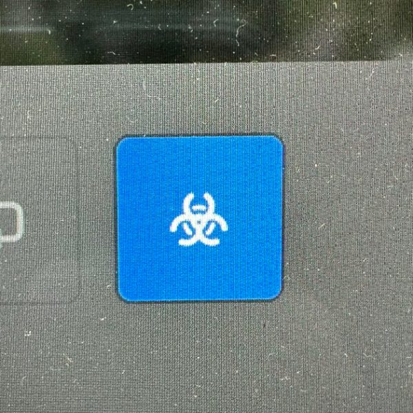 Bioweapon Defense Mode emblem activated on a Tesla dashboard