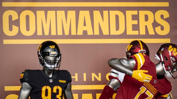 Washington Commanders logo and gear on mannequins